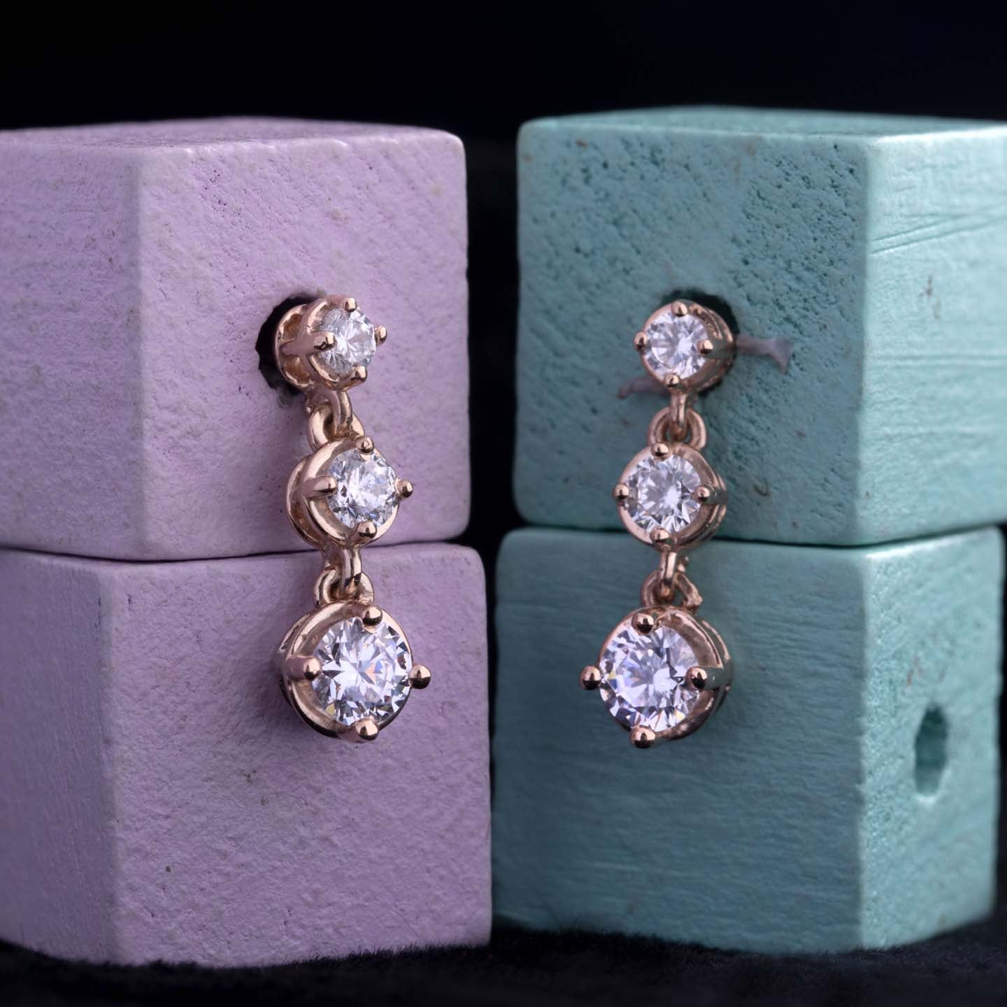 Three stone silver drop earrings