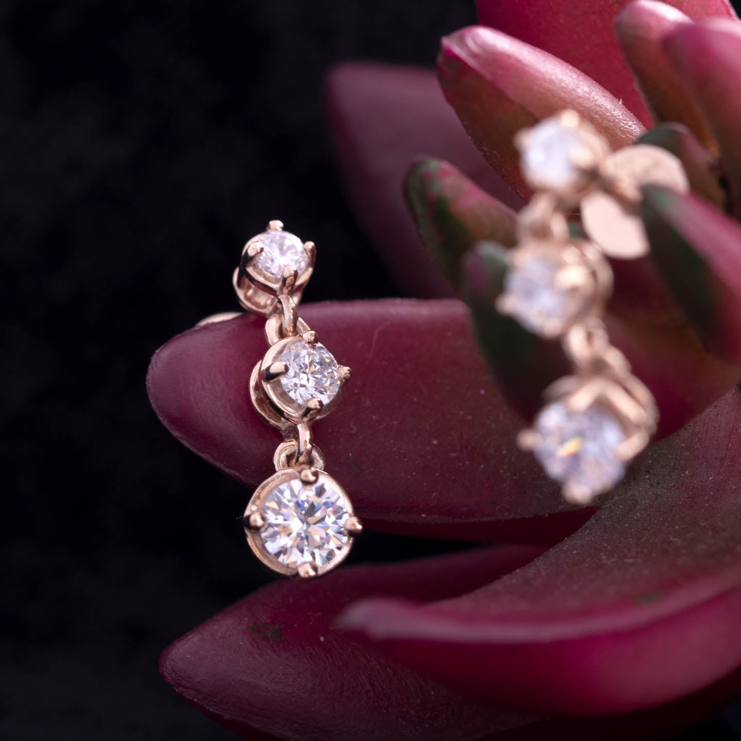 Three stone silver drop earrings